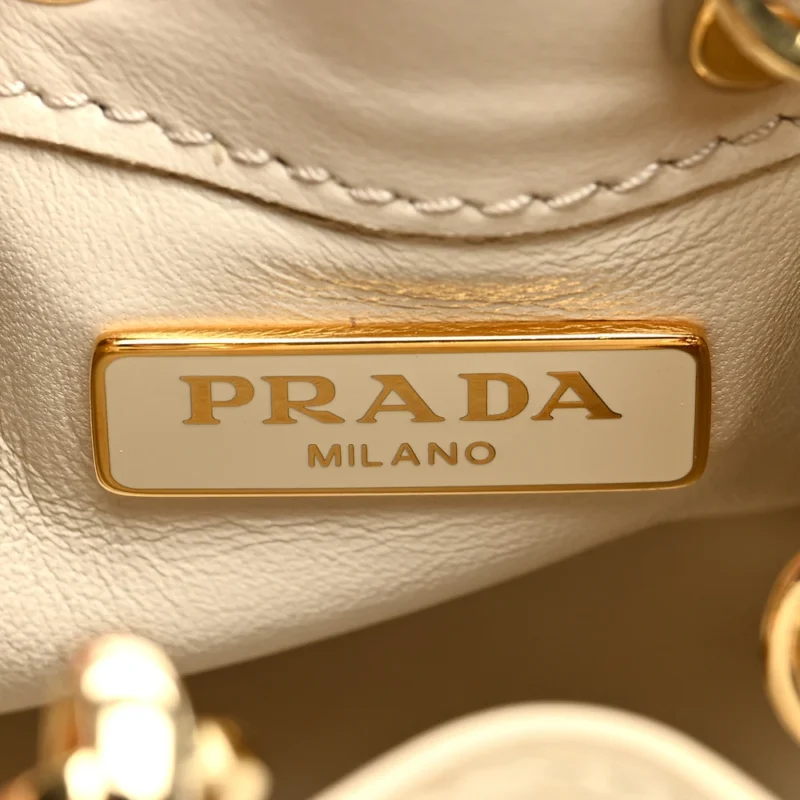 PRADA MINI METAL TRIANGLE LOGO DRAWCORD POUCH SHOULDER BAG AVORIO VERNICE LEATHER GOLD HARDWARE - Image 2
