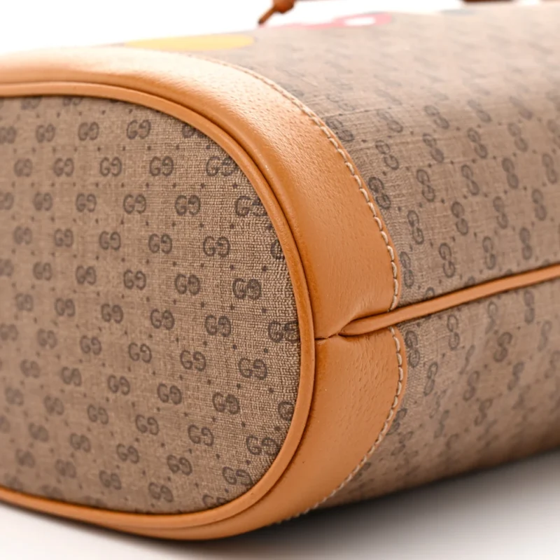 GUCCI X DISNEY MINI BUCKET BAG BEIGE / VINTAGE SUN OIL GG SUPREME MONOGRAM COATED CANVAS GOLD HARDWARE - Image 4
