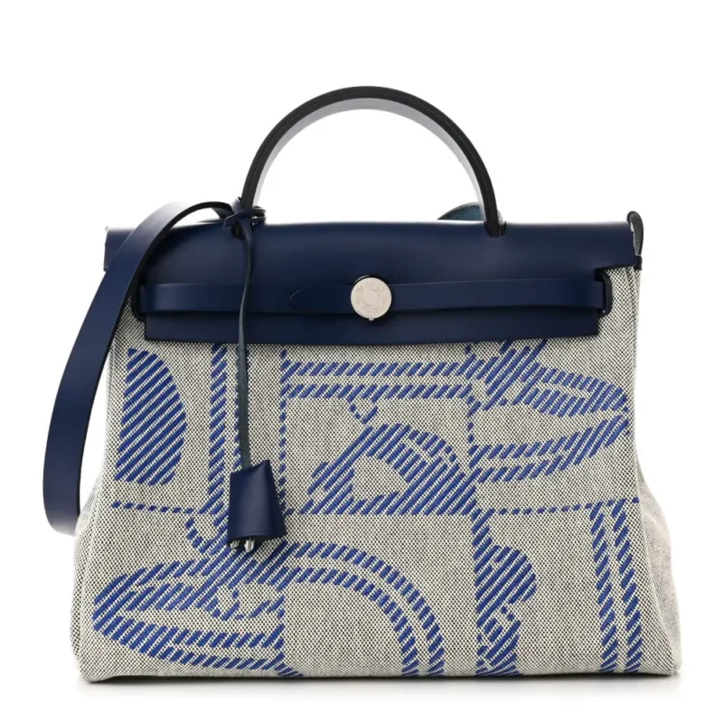 HERM??S BRIDES DE GALA HERBAG ZIP RETOURNE 31 PM BLEU DE FRANCE / ECRU / BLACK VACHE HUNTER LEATHER & TOILE H PALLADIUM SILVER HARDWARE