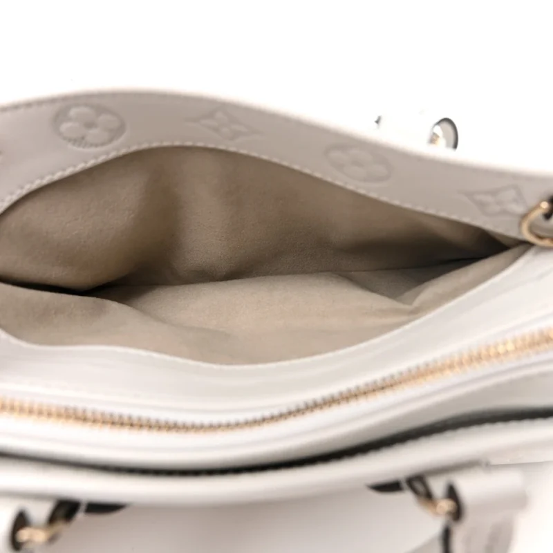 LOUIS VUITTON ONTHEGO EAST WEST PM WHITE EMBOSSED MONOGRAM CALFSKIN LEATHER LIGHT GOLD HARDWARE - Image 8
