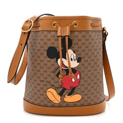 GUCCI X DISNEY MINI BUCKET BAG BEIGE / VINTAGE SUN OIL GG SUPREME MONOGRAM COATED CANVAS GOLD HARDWARE